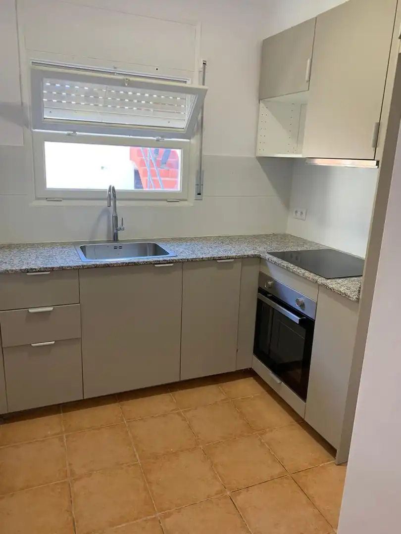 Cuina de Casa adosada en venda en Anglès amb Calefacció, Terrassa i Traster