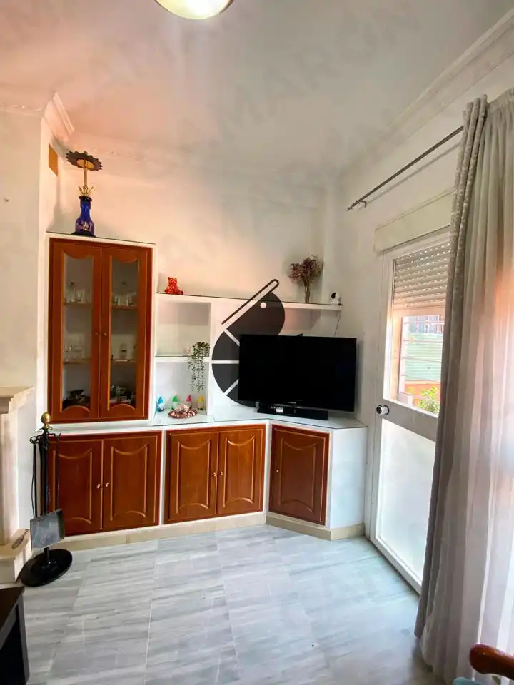 Sala de estar de Casa adosada en venta en Bormujos con Aire acondicionado, Terraza y Trastero