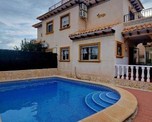 Swimming pool of Duplex for sale in Orihuela  with Air Conditioner, Private garden and Terrace