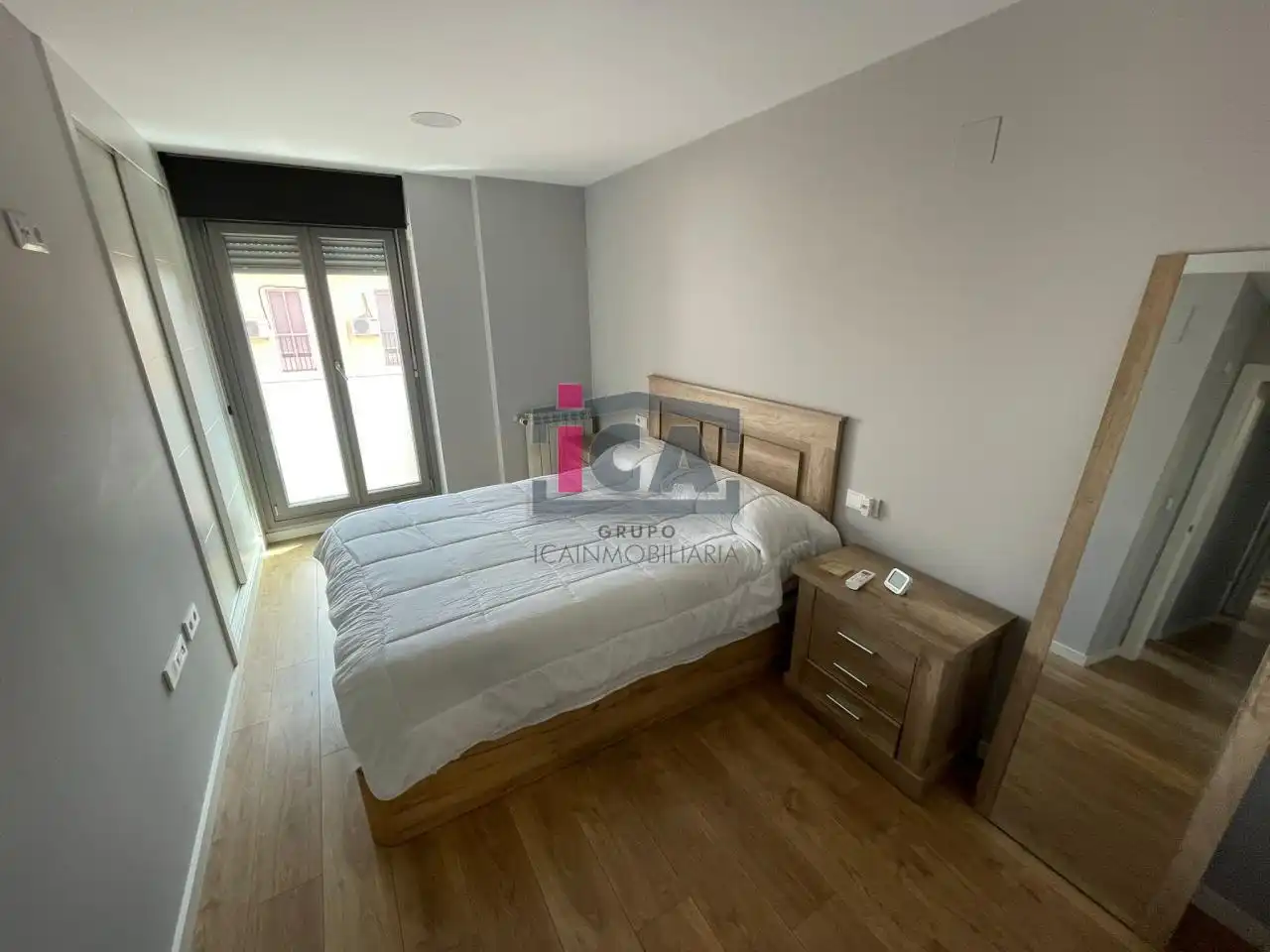 Dormitori de Apartament de lloguer en Cáceres amb Aire condicionat, Calefacció i Piscina