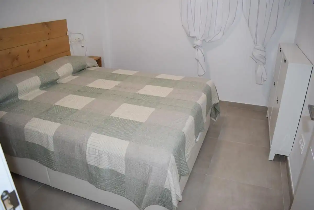 Habitación de Apartamento de alquiler en Almuñécar con Aire acondicionado, Terraza y Amueblado