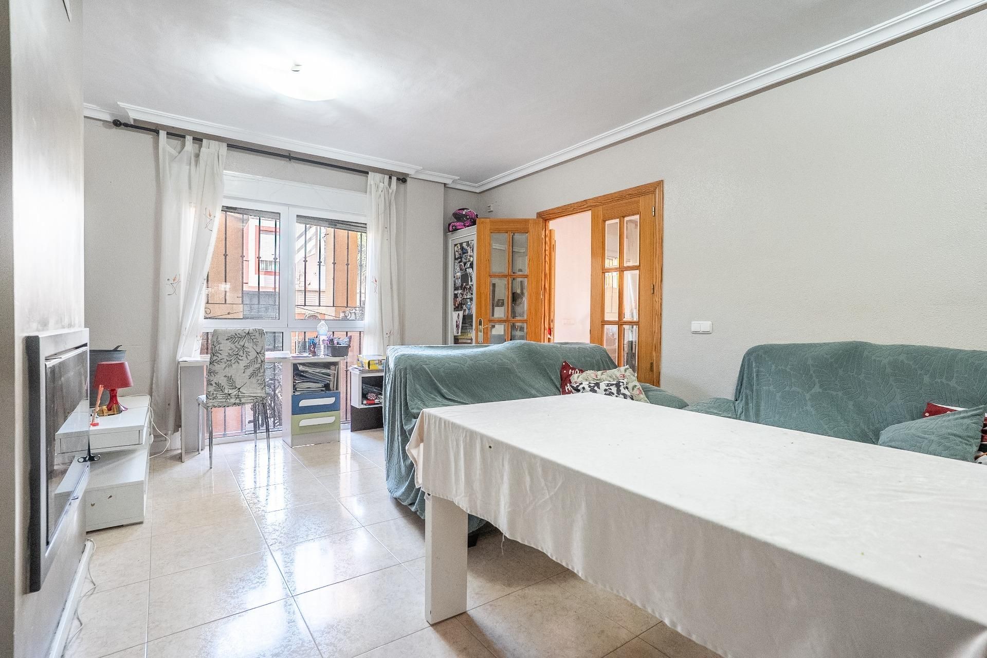 Sala d'estar de Casa adosada en venda en Benahadux amb Aire condicionat i Traster