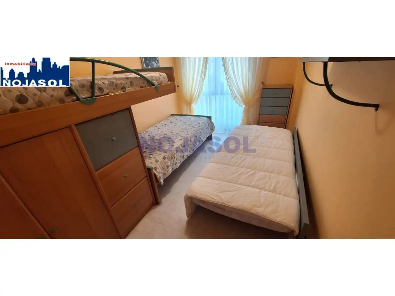 Dormitori de Apartament de lloguer en Noja amb Calefacció, Jardí privat i Terrassa