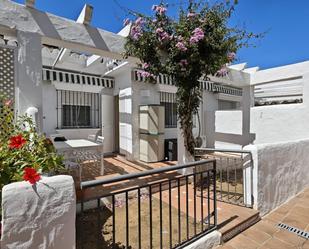 Jardí de Casa adosada de lloguer en Chiclana de la Frontera amb Aire condicionat, Terrassa i Piscina comunitària