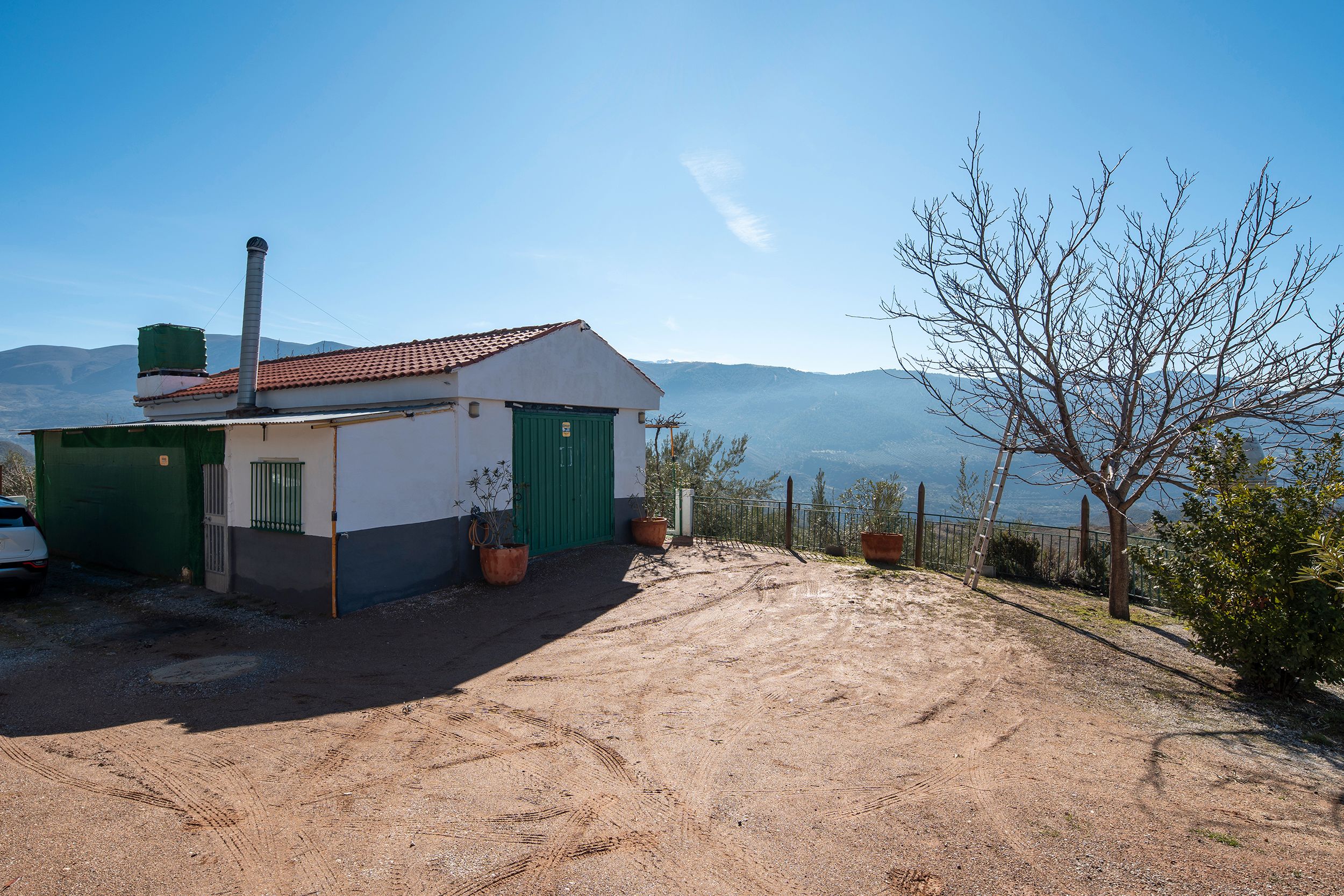 Vista exterior de Finca rústica en venda en Quéntar amb Jardí privat i Moblat