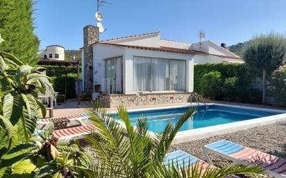 Exterior view of Single-family semi-detached for sale in L'Estartit  with Private garden, Swimming Pool and Furnished