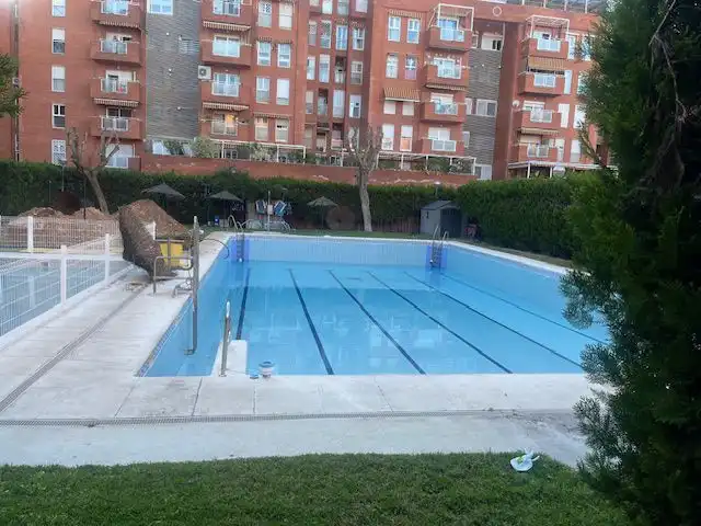 Swimming pool of Flat for sale in Sevilla  with Air Conditioner, Heating and Terrace
