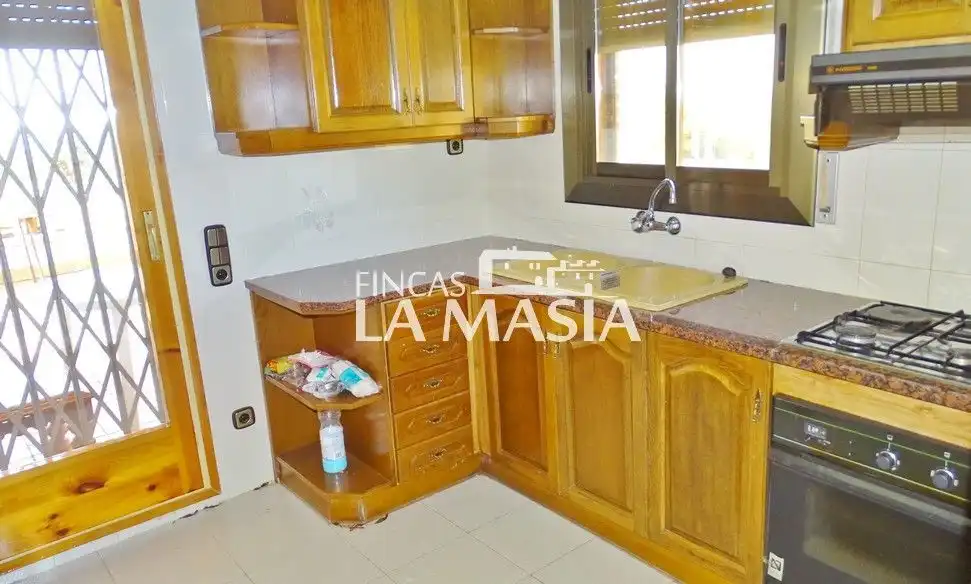 Cuina de Casa o xalet en venda en Olivella amb Calefacció, Jardí privat i Terrassa