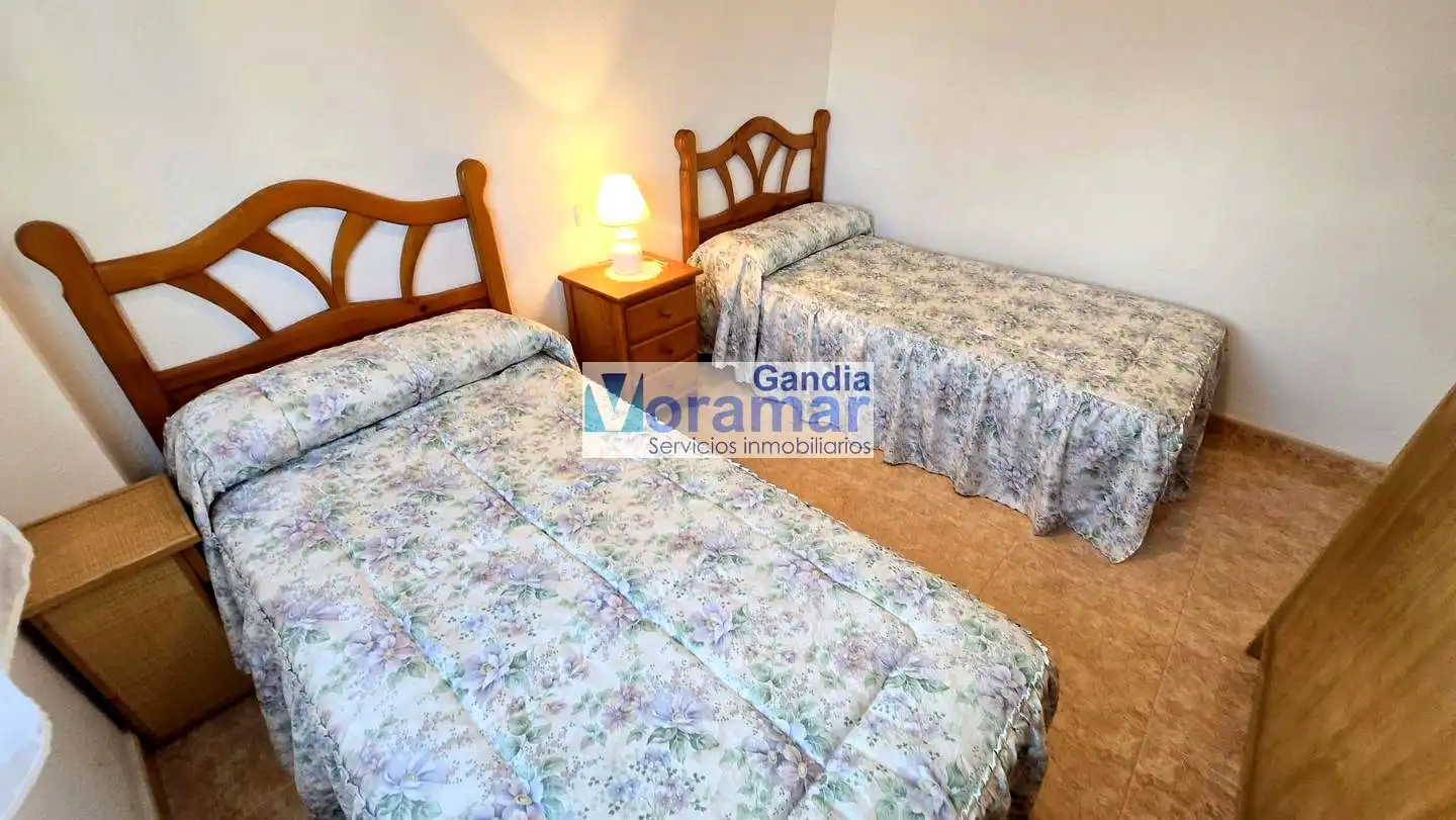 Habitación de Apartamento de alquiler en Gandia con Aire acondicionado, Calefacción y Piscina comunitaria