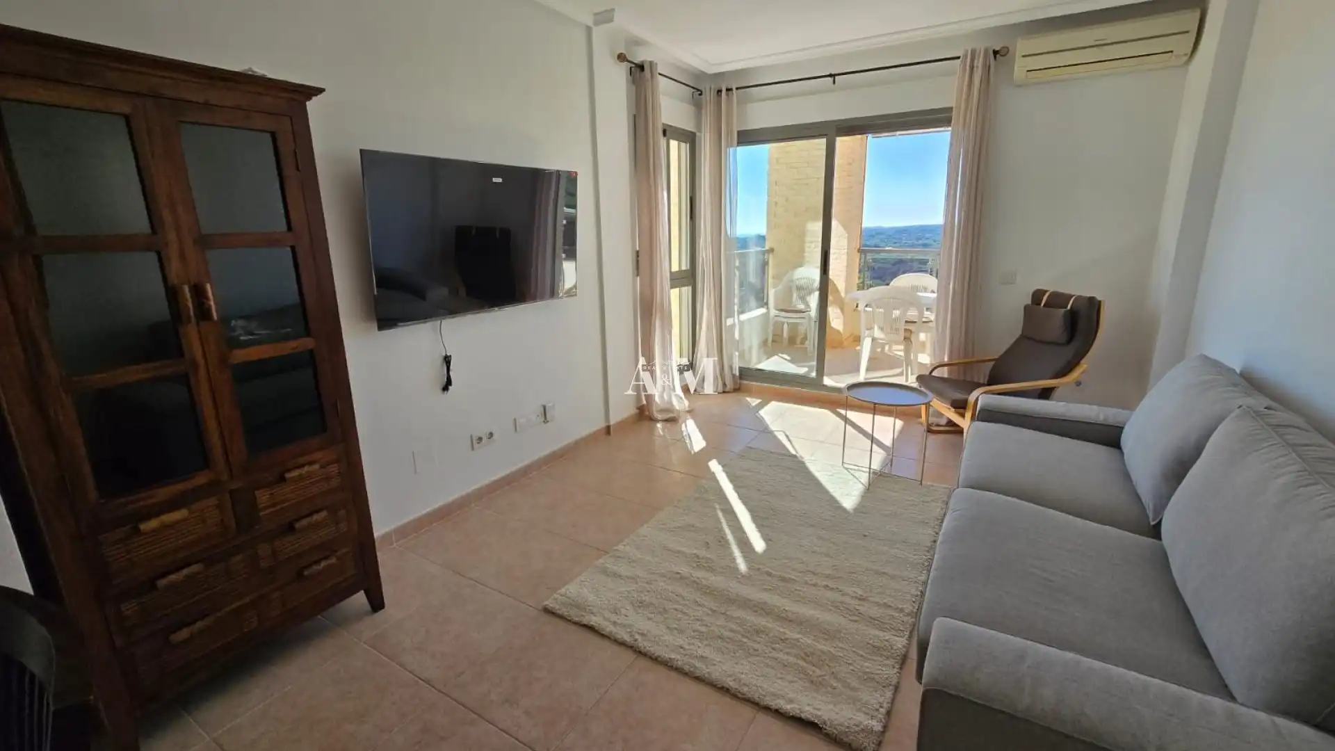 Sala d'estar de Apartament de lloguer en Guardamar del Segura amb Aire condicionat, Calefacció i Piscina