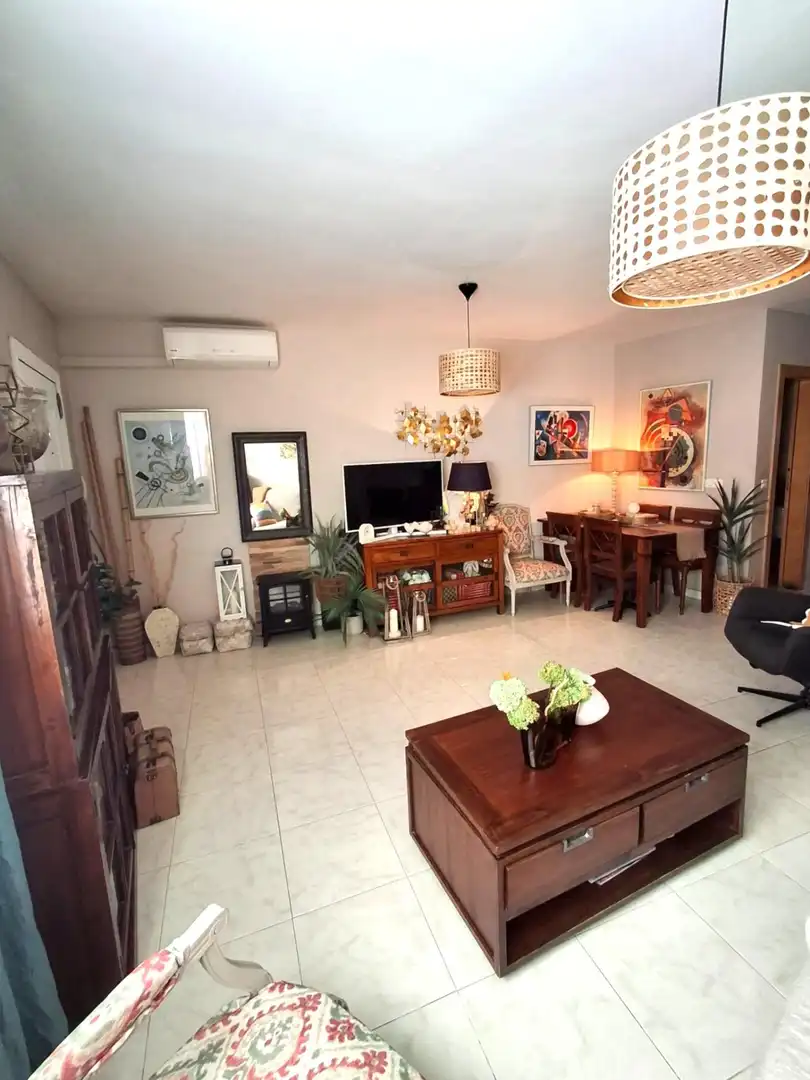Sala de estar de Casa adosada en venta en Málaga con Aire acondicionado y Balcón