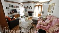 Sala d'estar de Casa o xalet en venda en El Puig de Santa Maria amb Aire condicionat, Terrassa i Balcó
