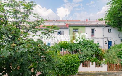 Exterior view of Single-family semi-detached for sale in  Madrid Capital  with Heating, Terrace and Balcony