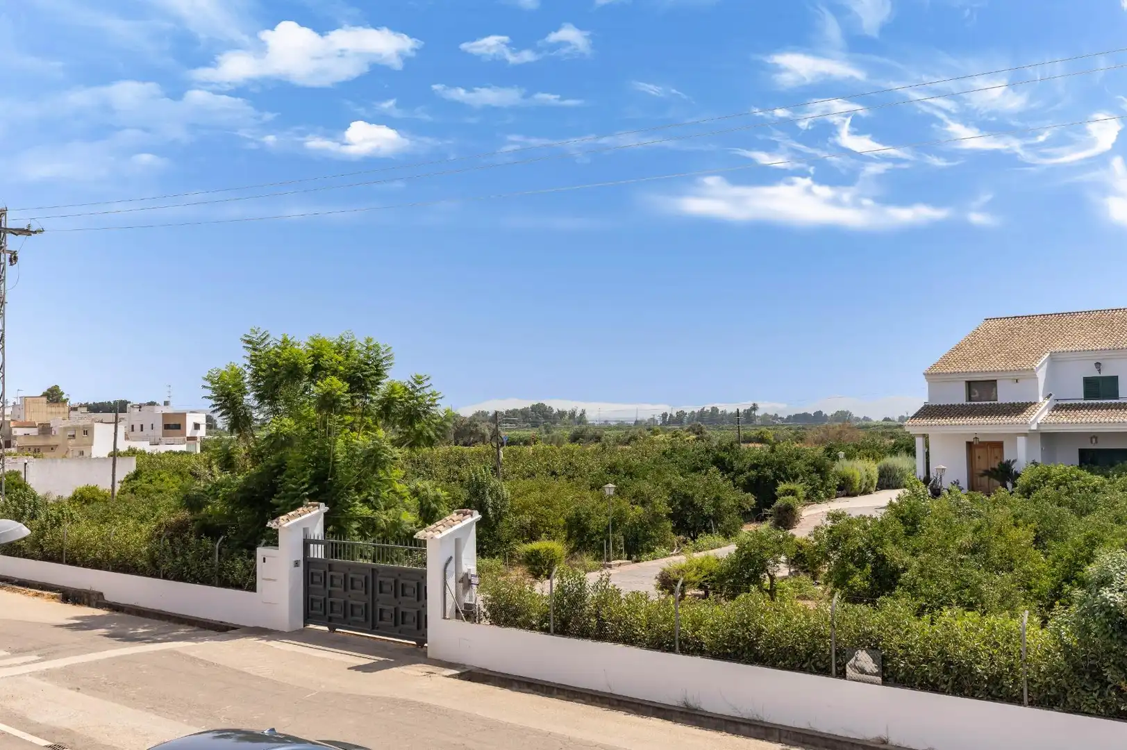 Vista exterior de Casa adosada en venta en Benimuslem con Aire acondicionado, Calefacción y Parquet