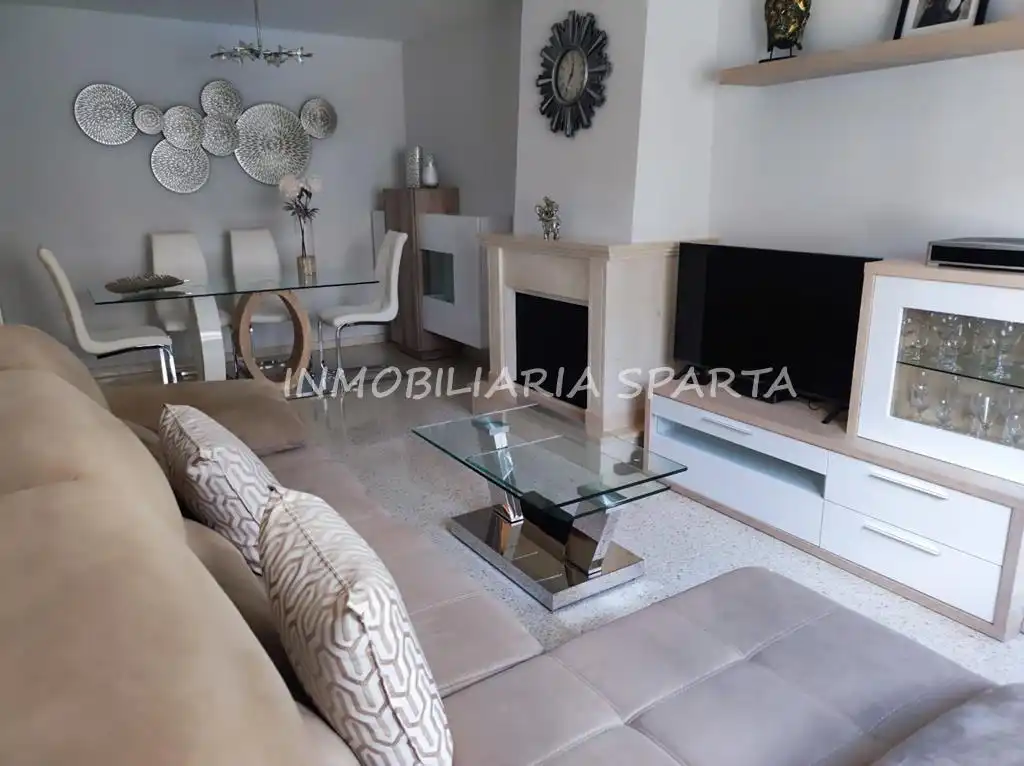 Sala de estar de Casa adosada en venta en Coria del Río con Aire acondicionado, Terraza y Trastero