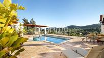 Exterior view of House or chalet for sale in Santa Eulària des Riu  with Air Conditioner, Terrace and Swimming Pool