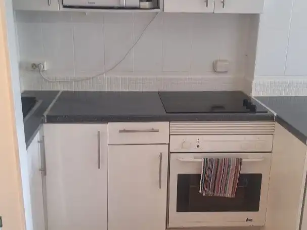 Küche von Wohnung zum Verkauf in Benalmádena mit Klimaanlage und Balkon
