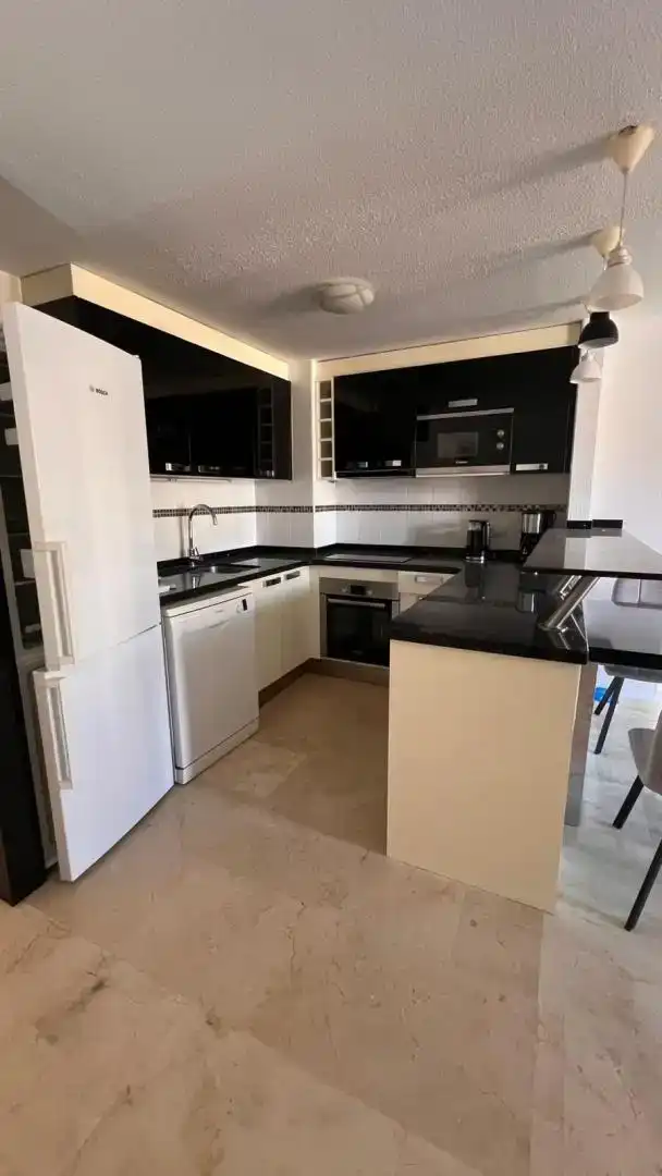 Cocina de Dúplex de alquiler en Calpe / Calp con Aire acondicionado, Jardín privado y Parquet