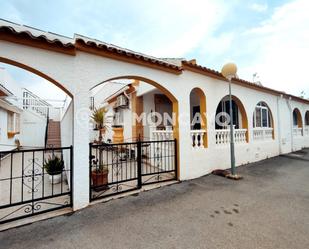 Exterior view of Single-family semi-detached for sale in Guardamar del Segura  with Air Conditioner, Heating and Private garden