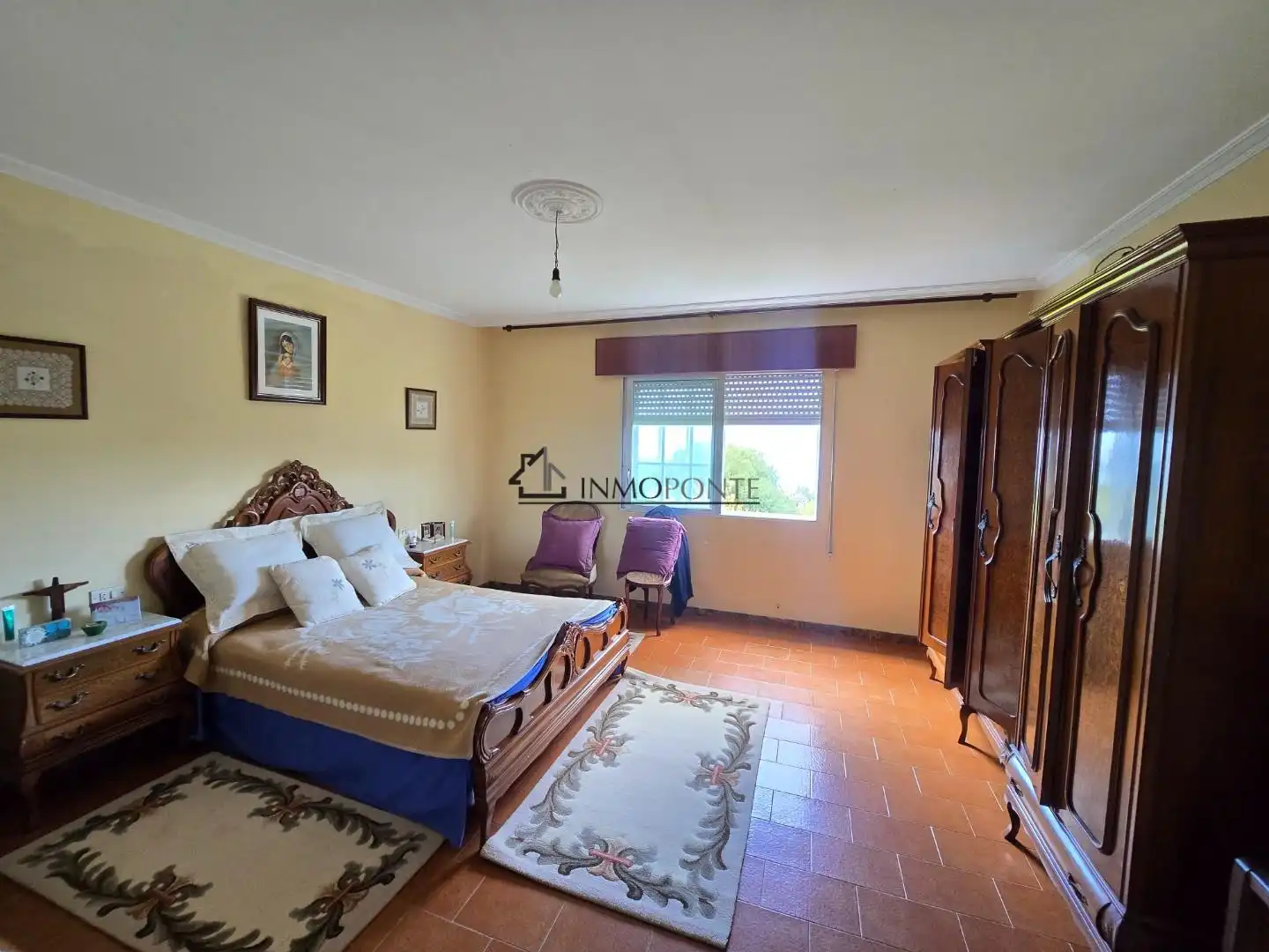 Dormitori de Casa o xalet en venda en Pontevedra Capital  amb Jardí privat