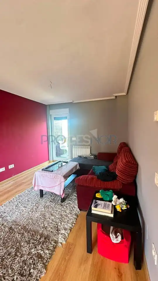 Sala d'estar de Casa adosada en venda en Onzonilla amb Calefacció, Jardí privat i Terrassa