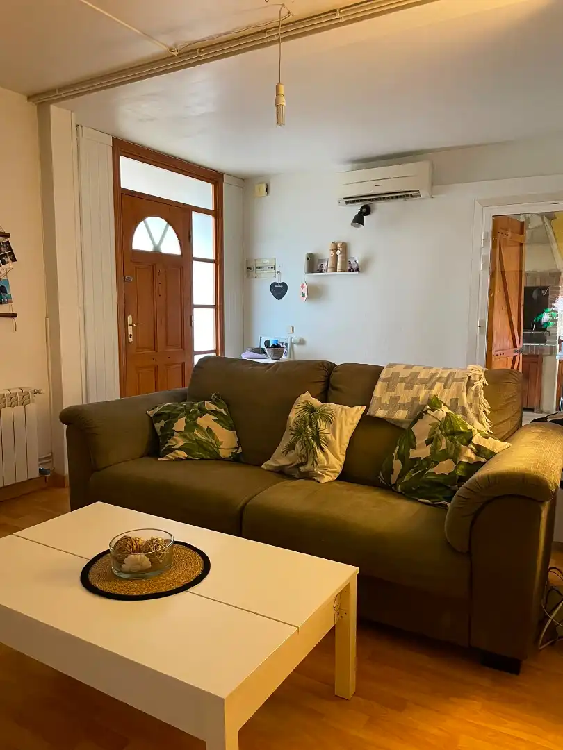 Sala d'estar de Casa adosada en venda en Els Pallaresos amb Aire condicionat, Calefacció i Jardí privat