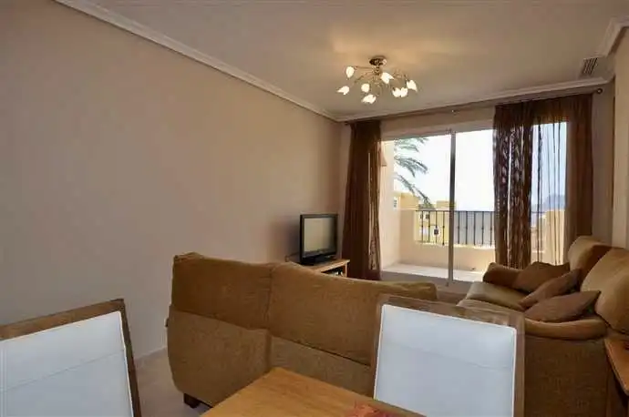 Sala d'estar de Apartament en venda en Calpe / Calp amb Aire condicionat, Calefacció i Jardí privat