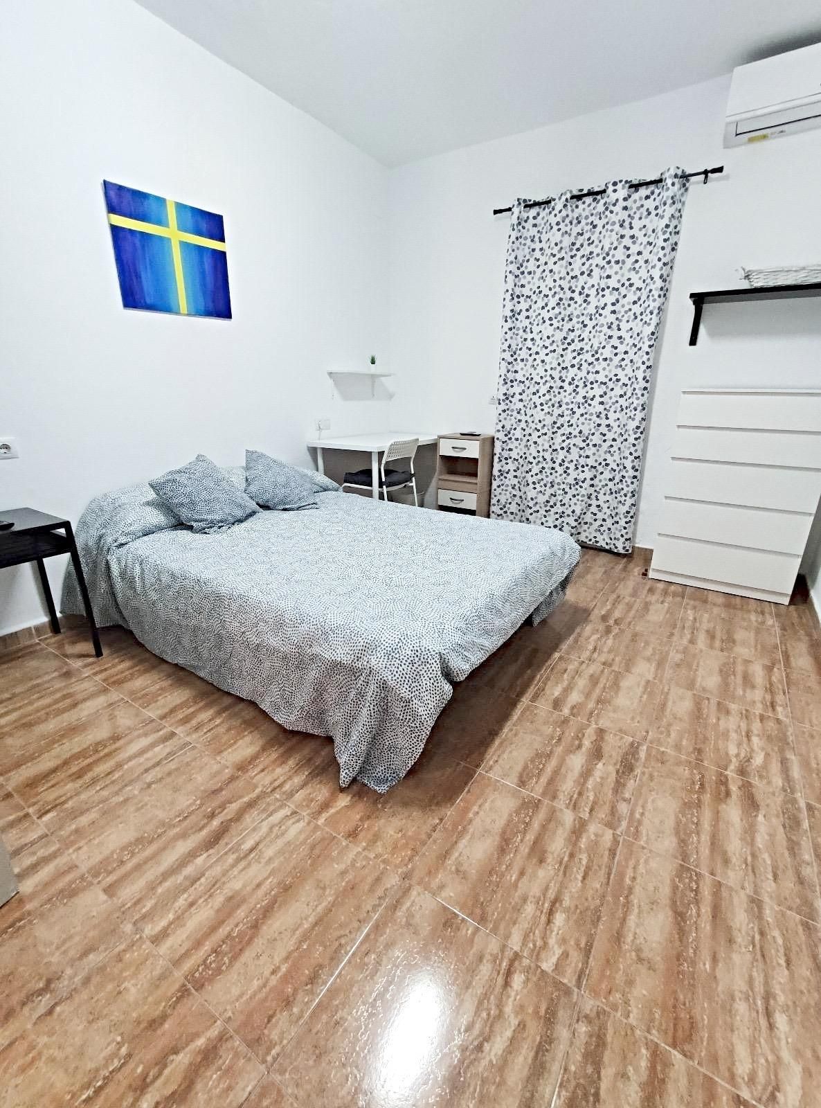 Dormitori de Apartament de lloguer en Málaga Capital amb Aire condicionat
