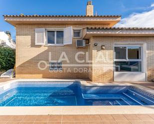 Vista exterior de Casa o xalet en venda en Cambrils amb Aire condicionat, Jardí privat i Parquet