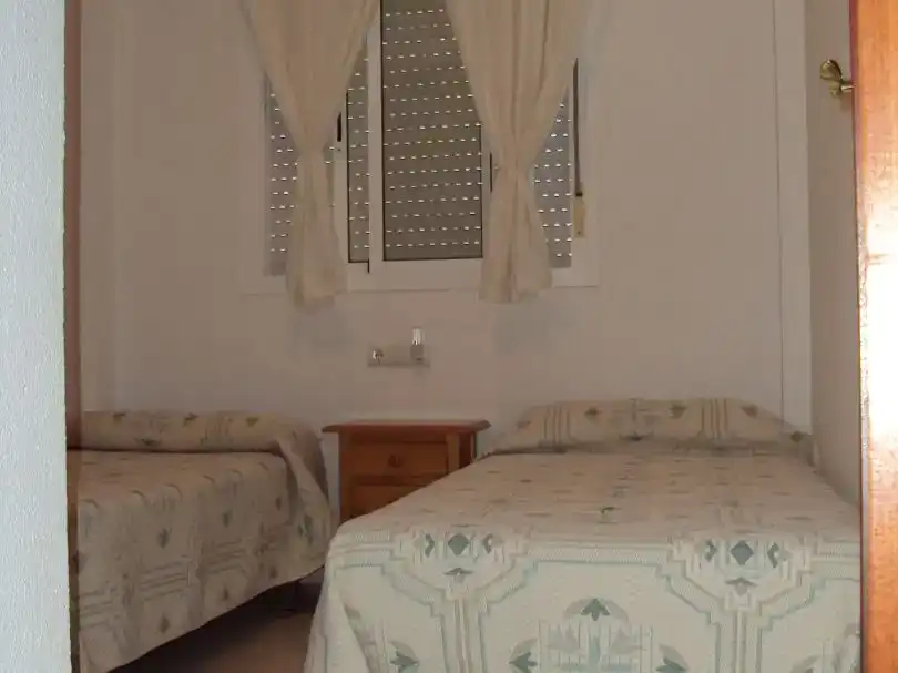 Dormitori de Pis de lloguer en Chipiona amb Piscina i Moblat