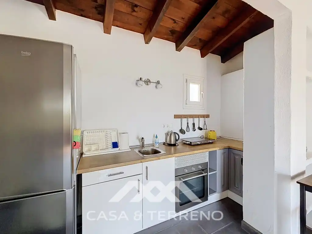 Cuina de Casa o xalet en venda en Vélez-Málaga amb Aire condicionat, Jardí privat i Terrassa