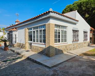 Exterior view of House or chalet for sale in Chiclana de la Frontera  with Air Conditioner, Heating and Private garden