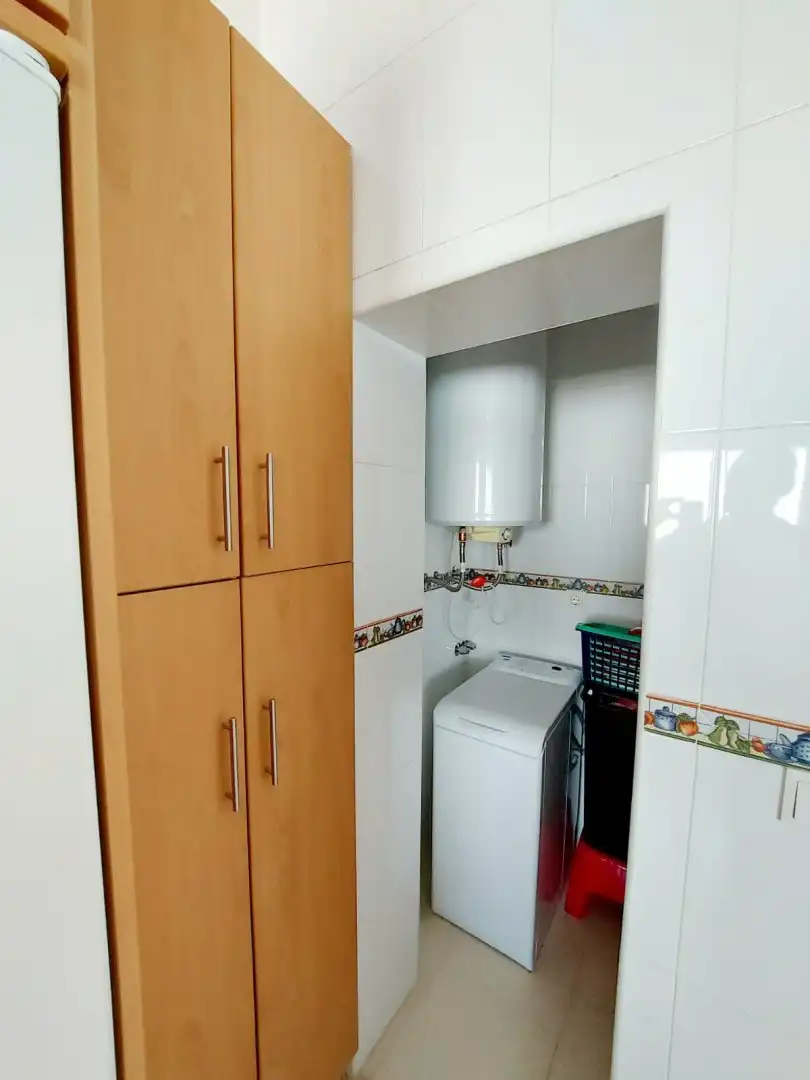 Kitchen of Flat for sale in Brenes  with Air Conditioner