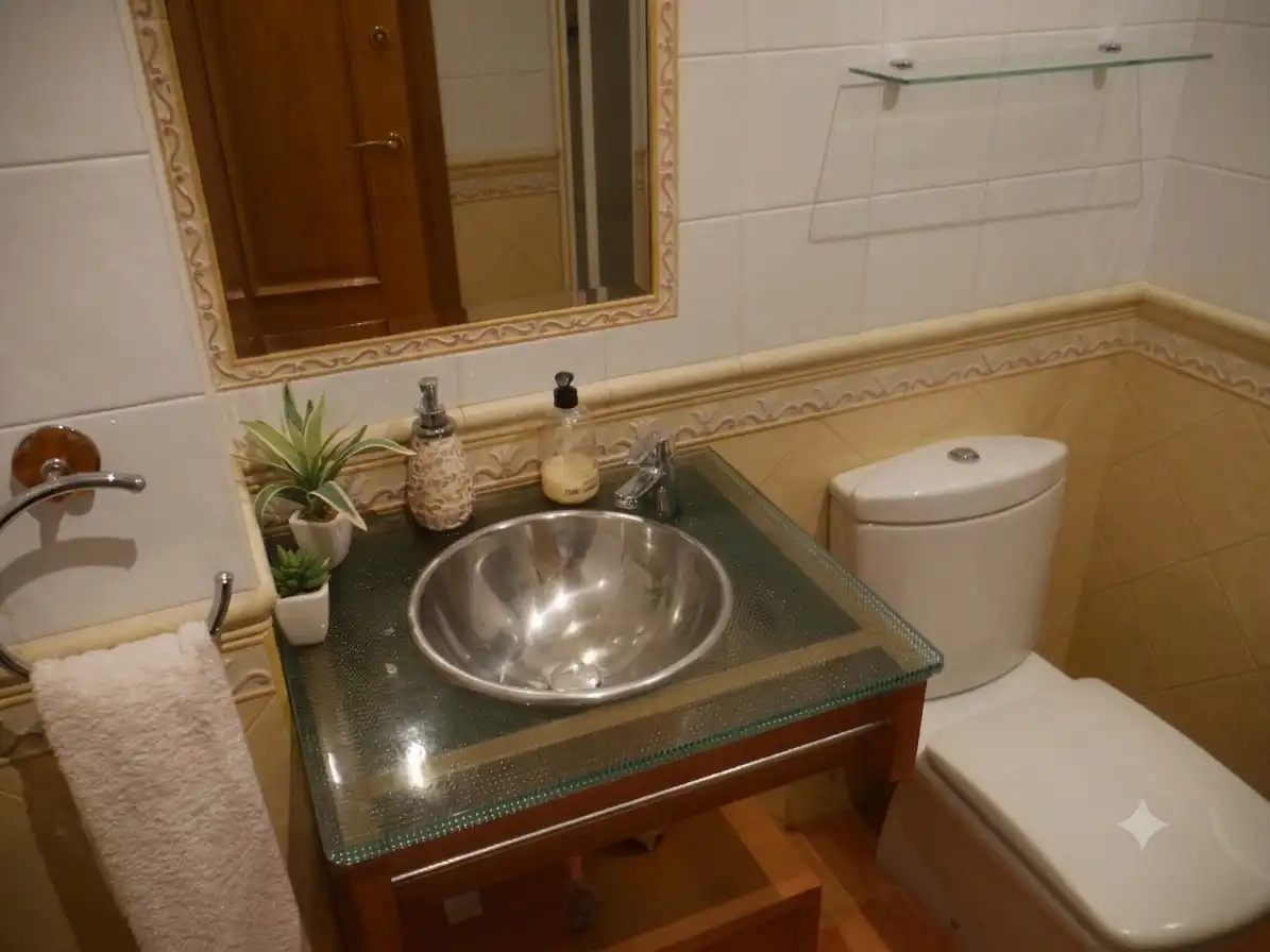 Bany de Casa adosada en venda en Sagunto / Sagunt amb Aire condicionat, Calefacció i Jardí privat
