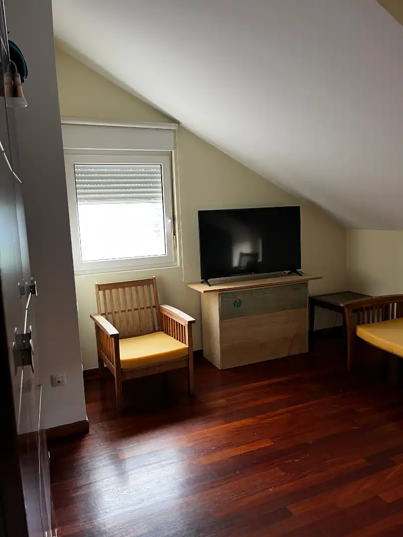Sala de estar de Casa adosada en venta en Torrelavega  con Calefacción, Terraza y Trastero
