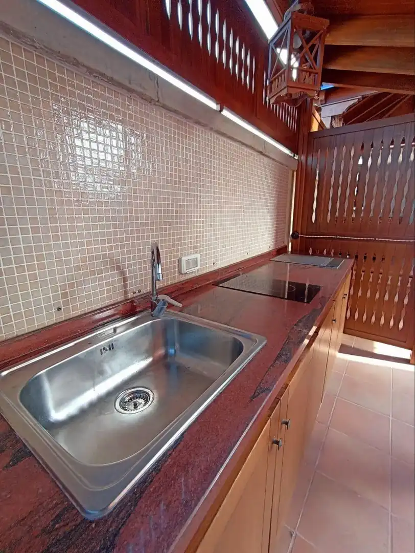 Cocina de Casa adosada en venta en Santiago del Teide con Trastero, Jacuzzi y Piscina comunitaria