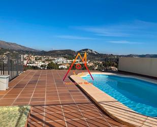 Swimming pool of Flat to rent in Calpe / Calp  with Air Conditioner, Oven and Washing machine