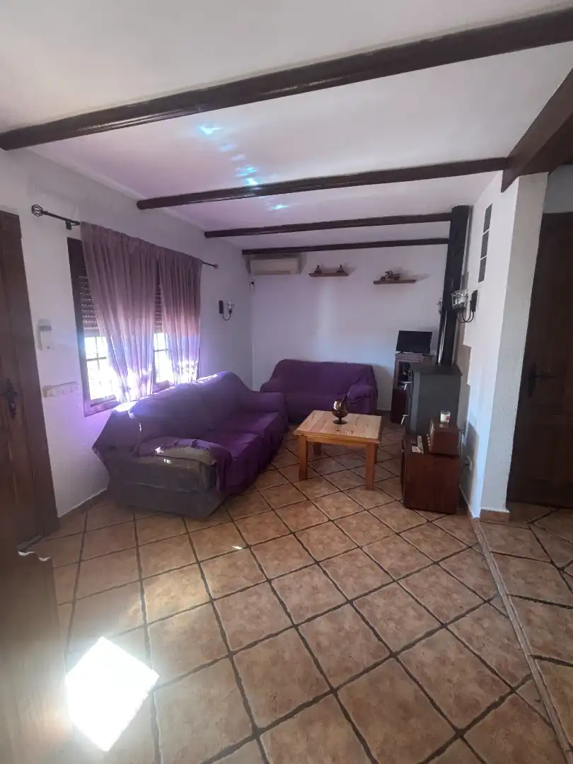 Sala de estar de Casa adosada en venta en Marbella con Aire acondicionado, Terraza y Amueblado