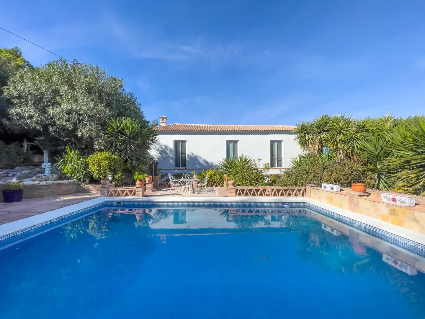 Casa rústica con piscina en venta en Coín