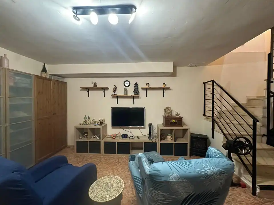 Sala d'estar de Casa adosada en venda en Zuera amb Calefacció, Jardí privat i Terrassa