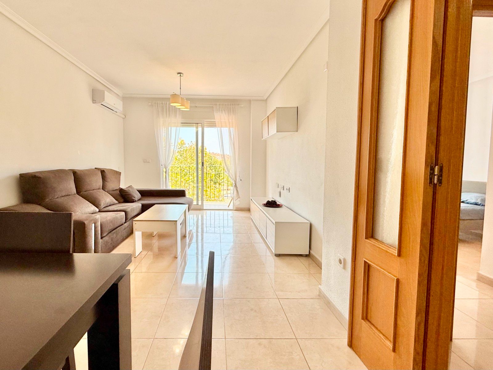 Living room of Flat for sale in Pilar de la Horadada  with Air Conditioner, Terrace and Storage room