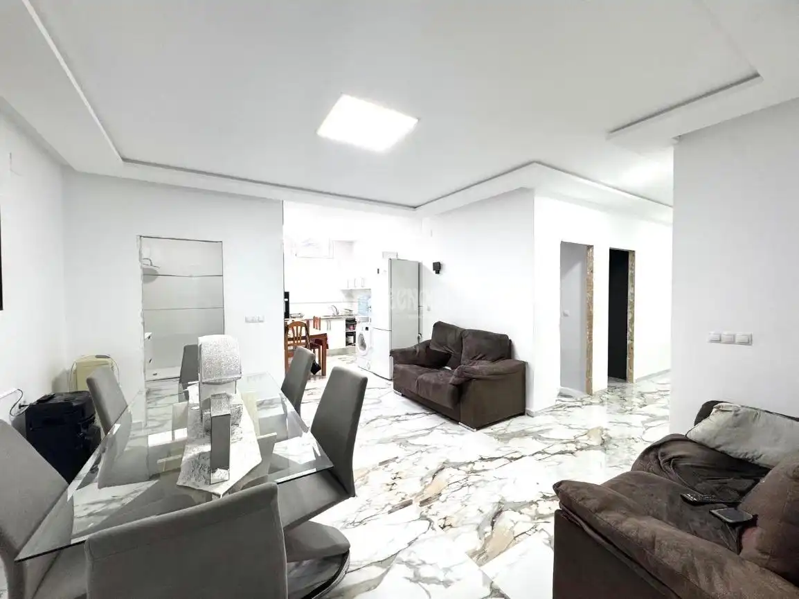 Sala d'estar de Casa adosada en venda en Almería amb Calefacció
