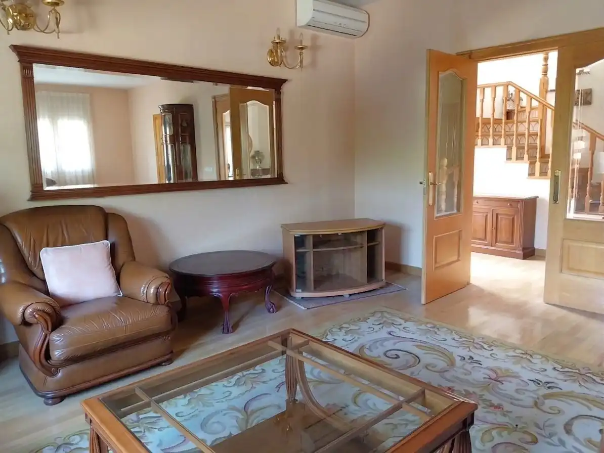 Sala de estar de Casa o chalet en venta en Pozuelo de Alarcón con Aire acondicionado, Calefacción y Jardín privado
