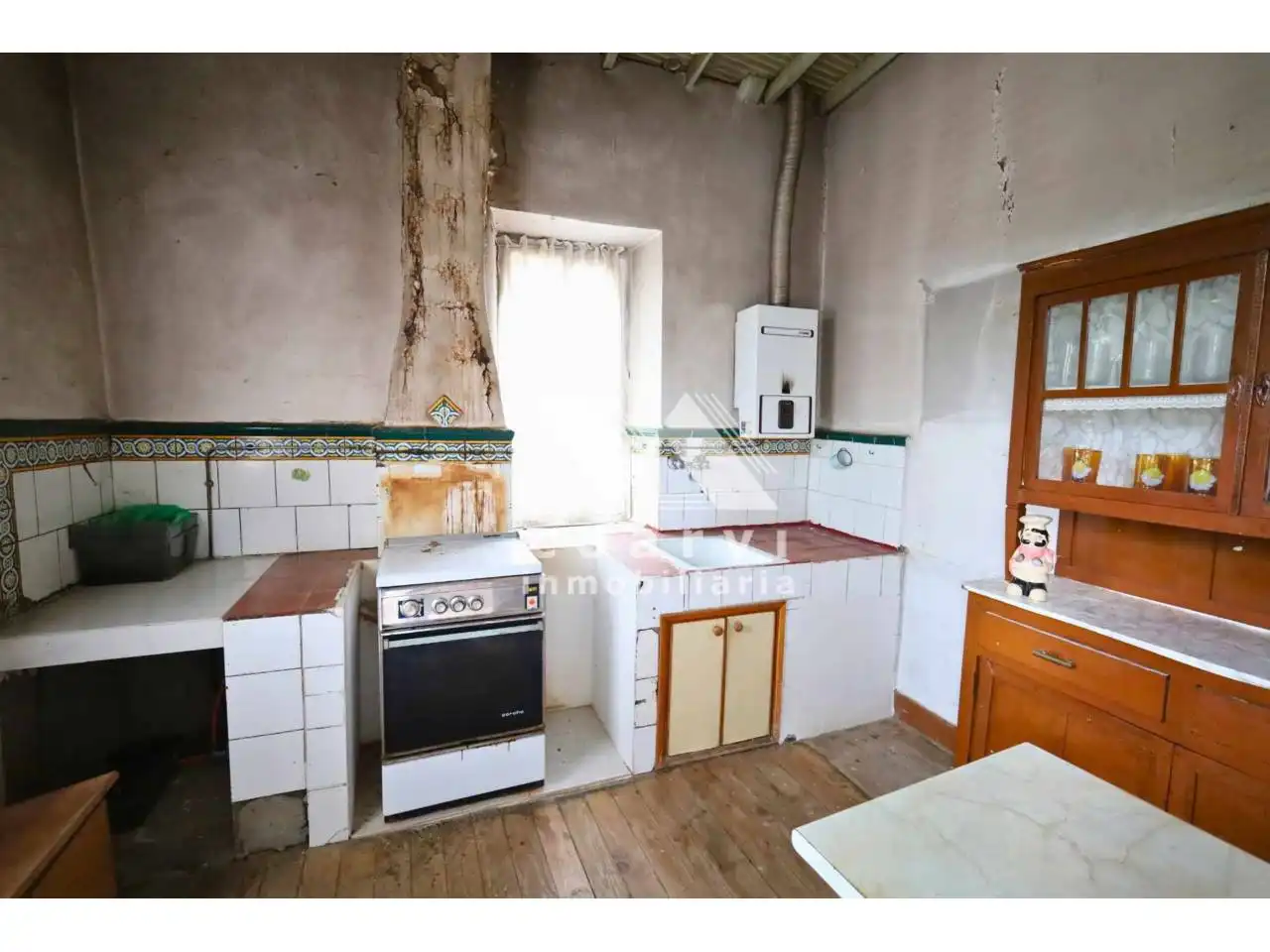 Cuina de Casa o xalet en venda en A Merca   amb Jardí privat, Terrassa i Moblat