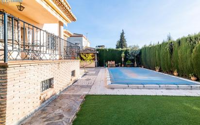 Swimming pool of House or chalet for sale in Cúllar Vega  with Air Conditioner, Terrace and Swimming Pool