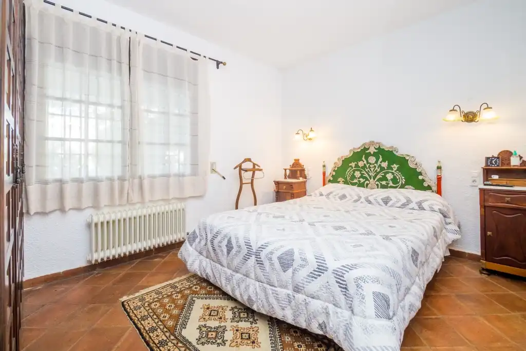 Schlafzimmer von Haus oder Chalet zum Verkauf in Castell d'Aro, Platja d'Aro i s'Agaró mit Klimaanlage, Heizung und Privatgarten
