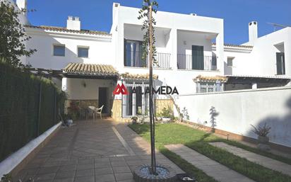 Jardí de Casa adosada en venda en Chiclana de la Frontera amb Calefacció, Jardí privat i Terrassa