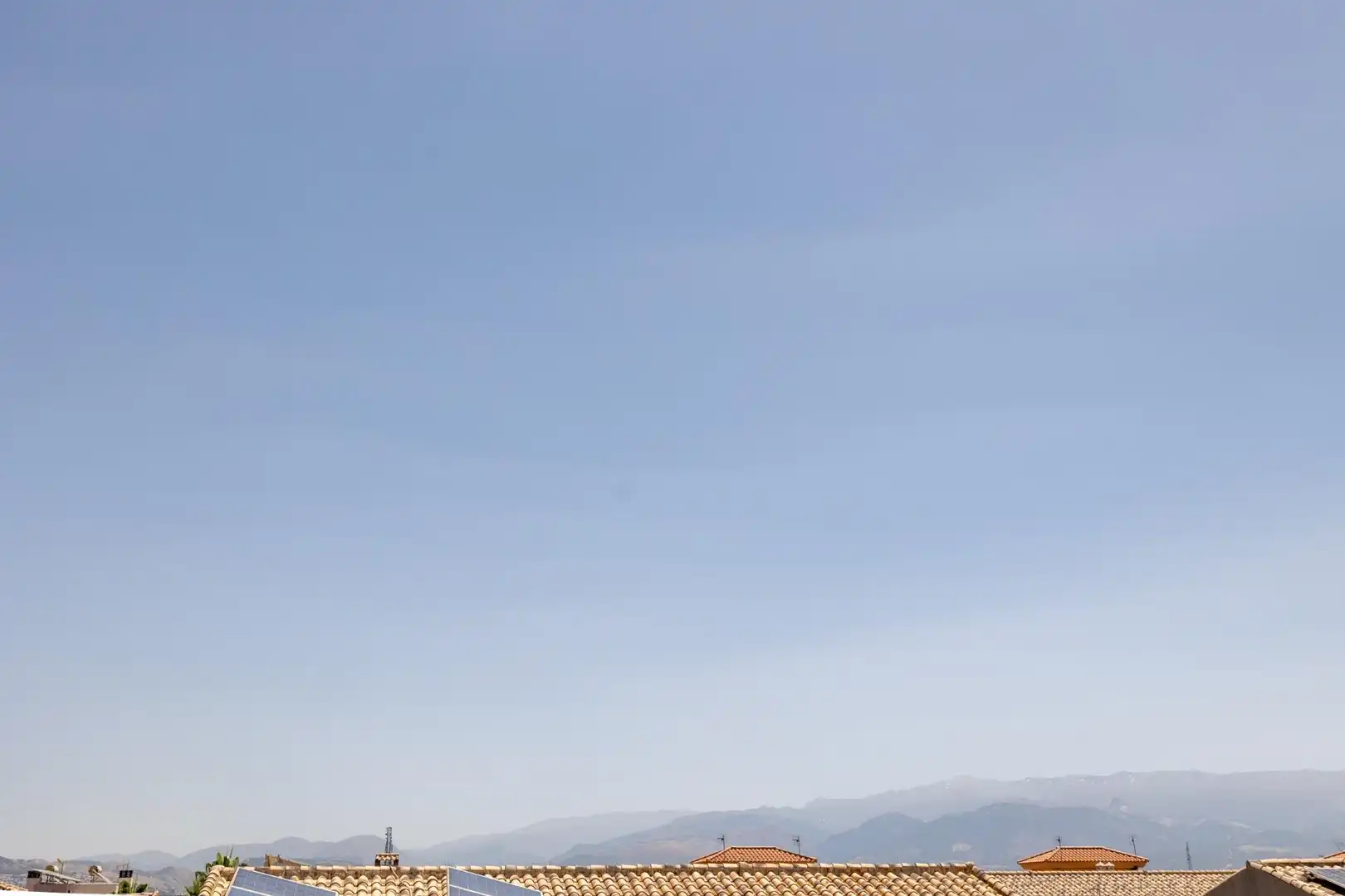 Vista exterior de Casa adosada en venda en Vegas del Genil amb Aire condicionat, Calefacció i Jardí privat