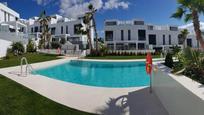 Piscina de Casa adosada en venda en Rincón de la Victoria amb Aire condicionat, Calefacció i Terrassa