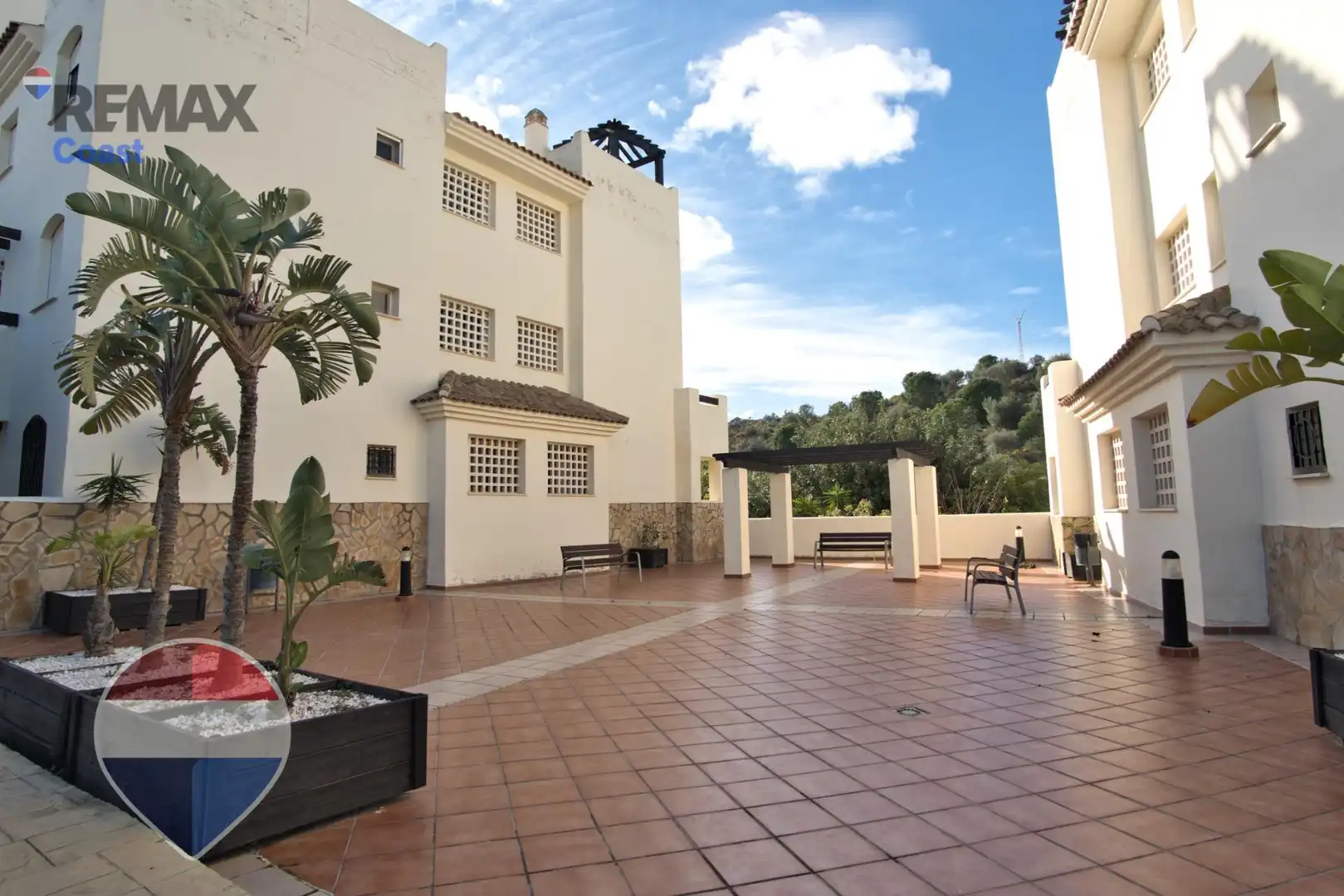Außenansicht von Wohnung zum Verkauf in Benalmádena mit Klimaanlage, Privatgarten und Gemeinschaftspool